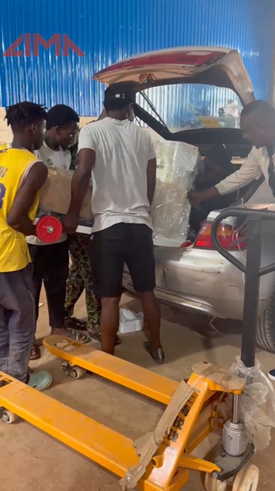 Customers pick up goods at Nigeria warehouse